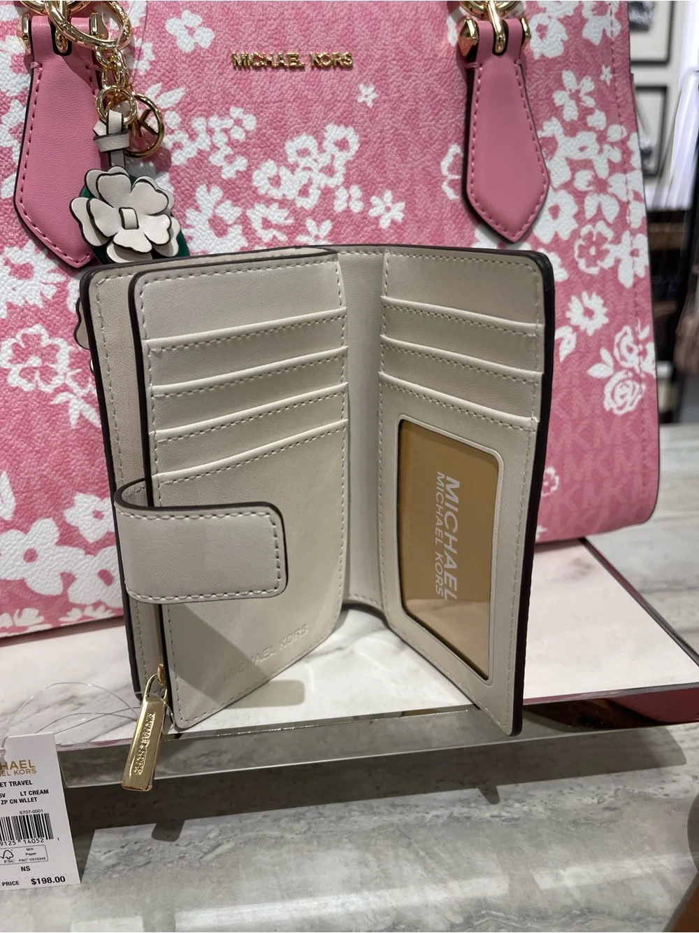 Michael Kors Jet Set Travel Medium Logo Debossed Billfold Wallet Light Cream NWT